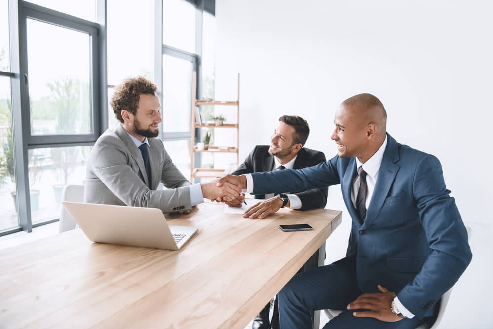 Business man hiring talent for company expansion. 