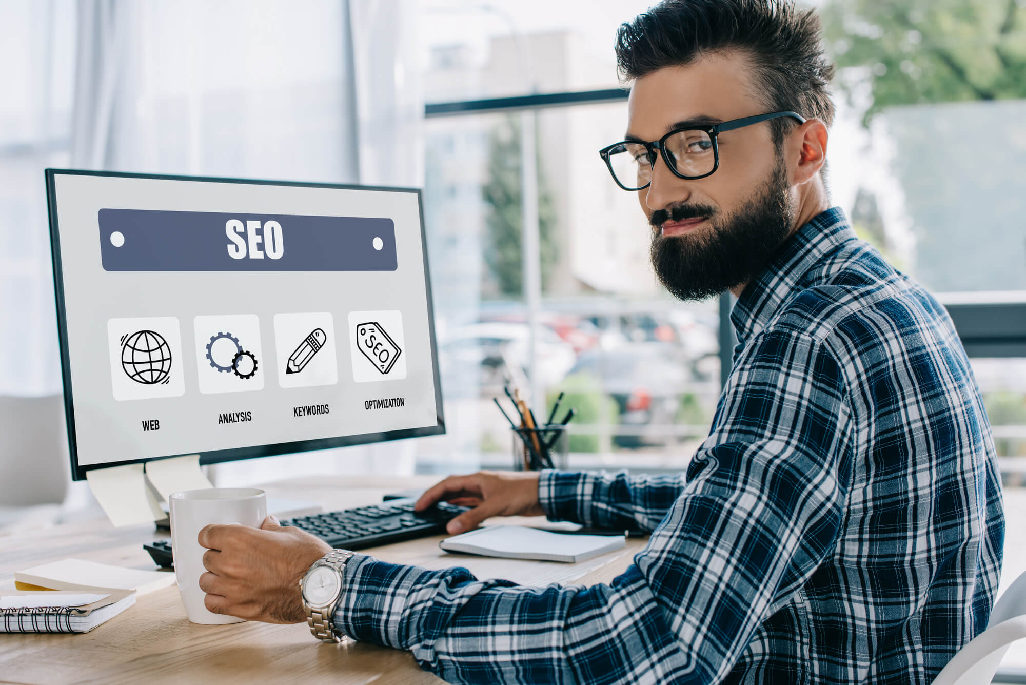 seo manager working on desktop