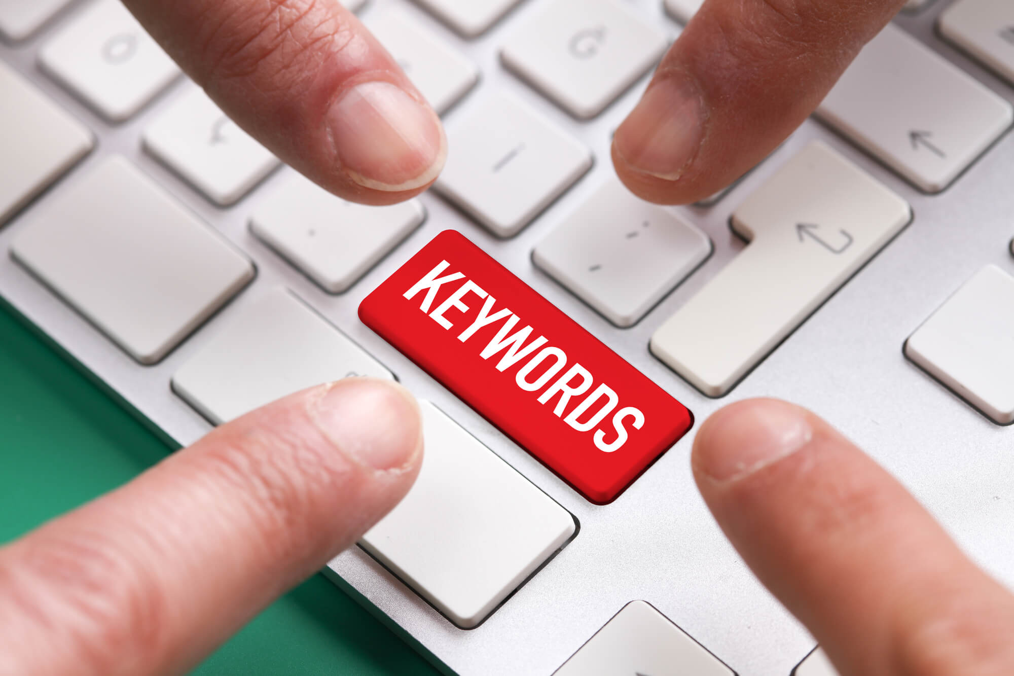4 fingers pointing at keyword button