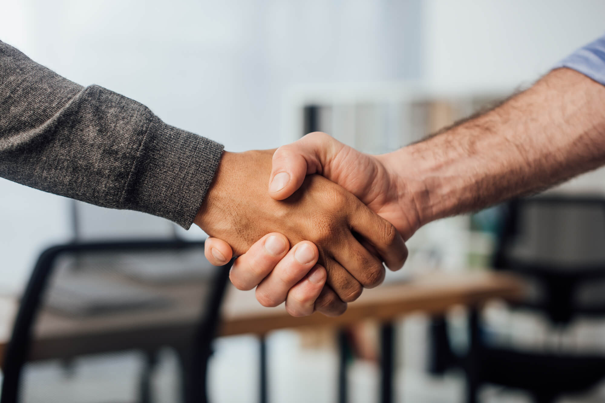 two people handshaking