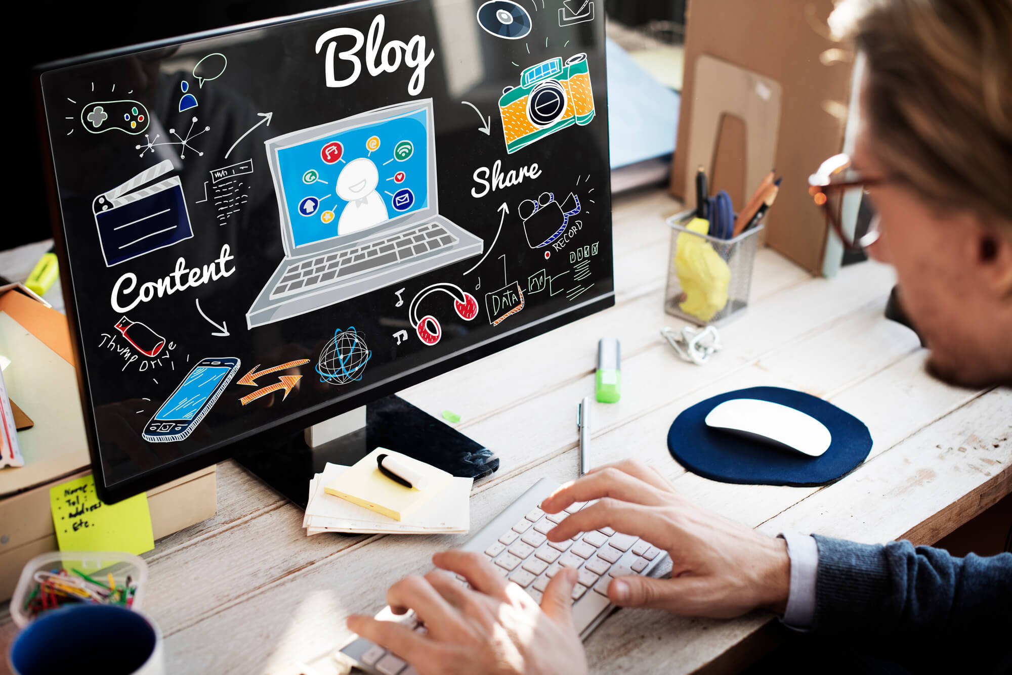 content marketer working on computer