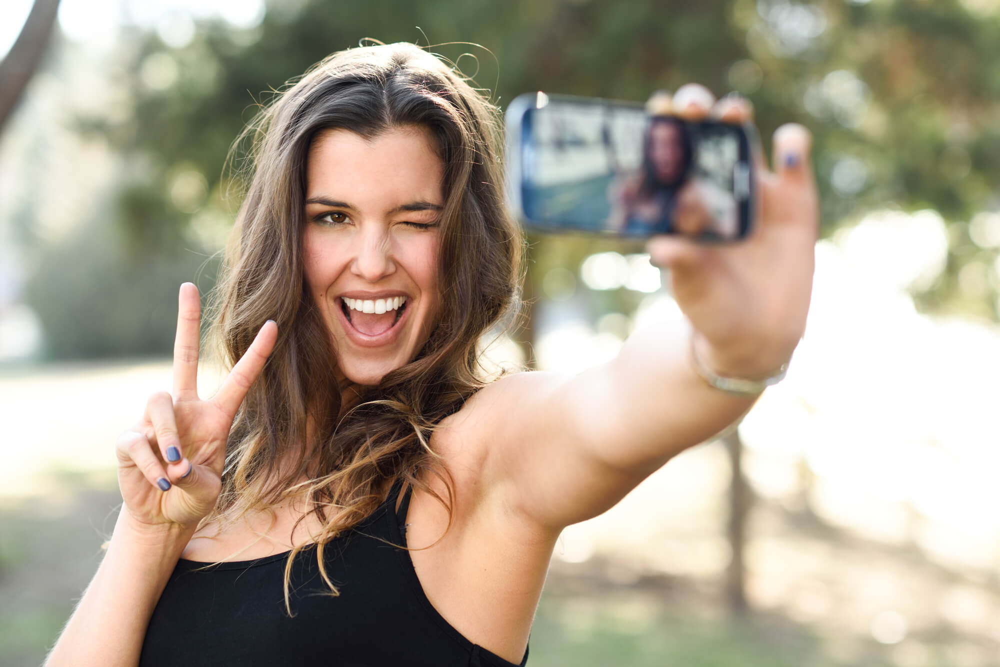 a woman taking a selfie