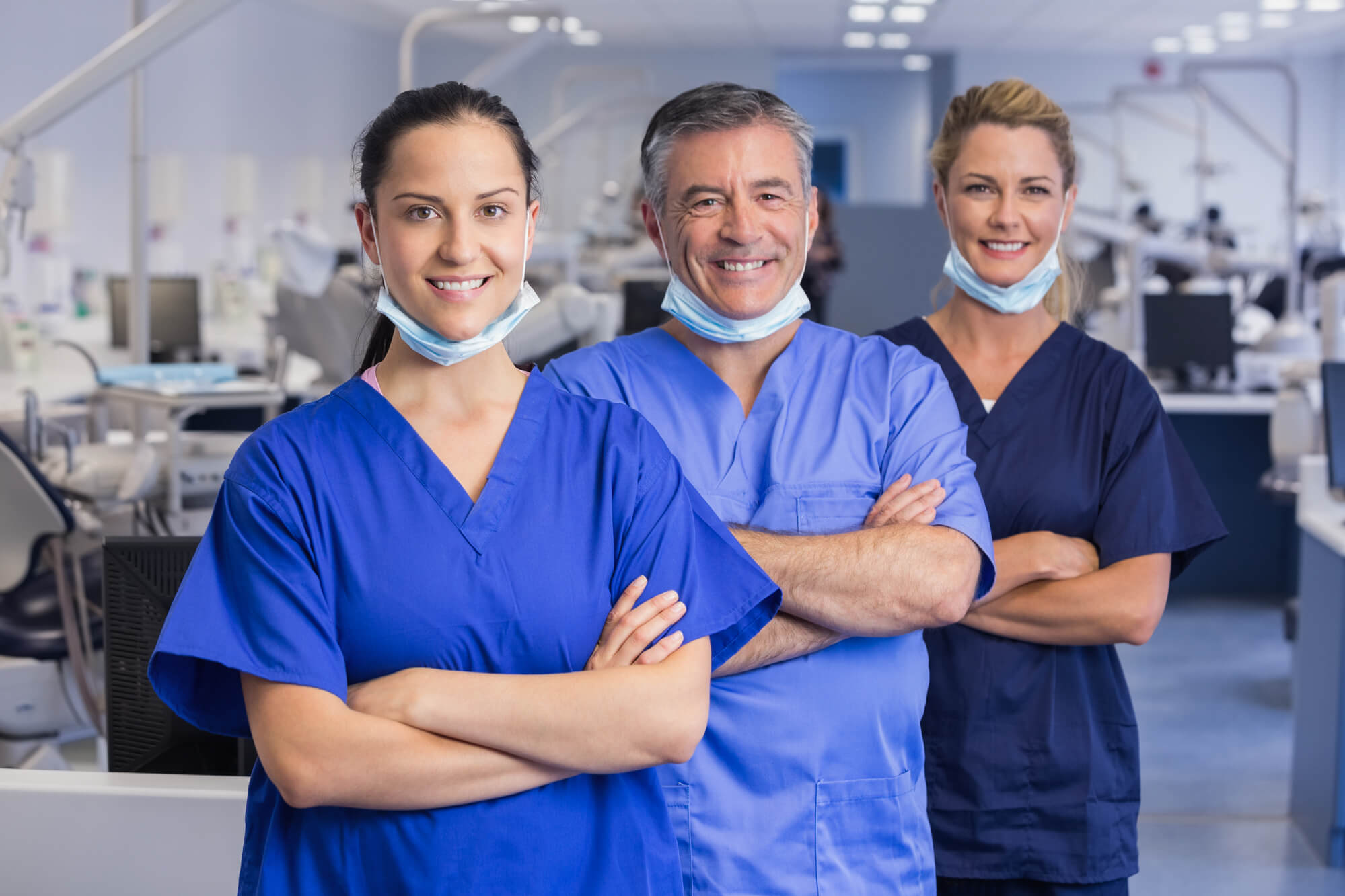 three dentists smiling
