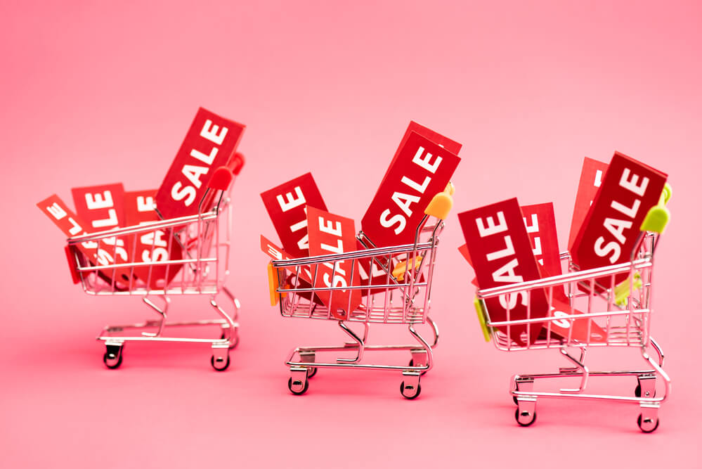 sale tags inside a shopping cart