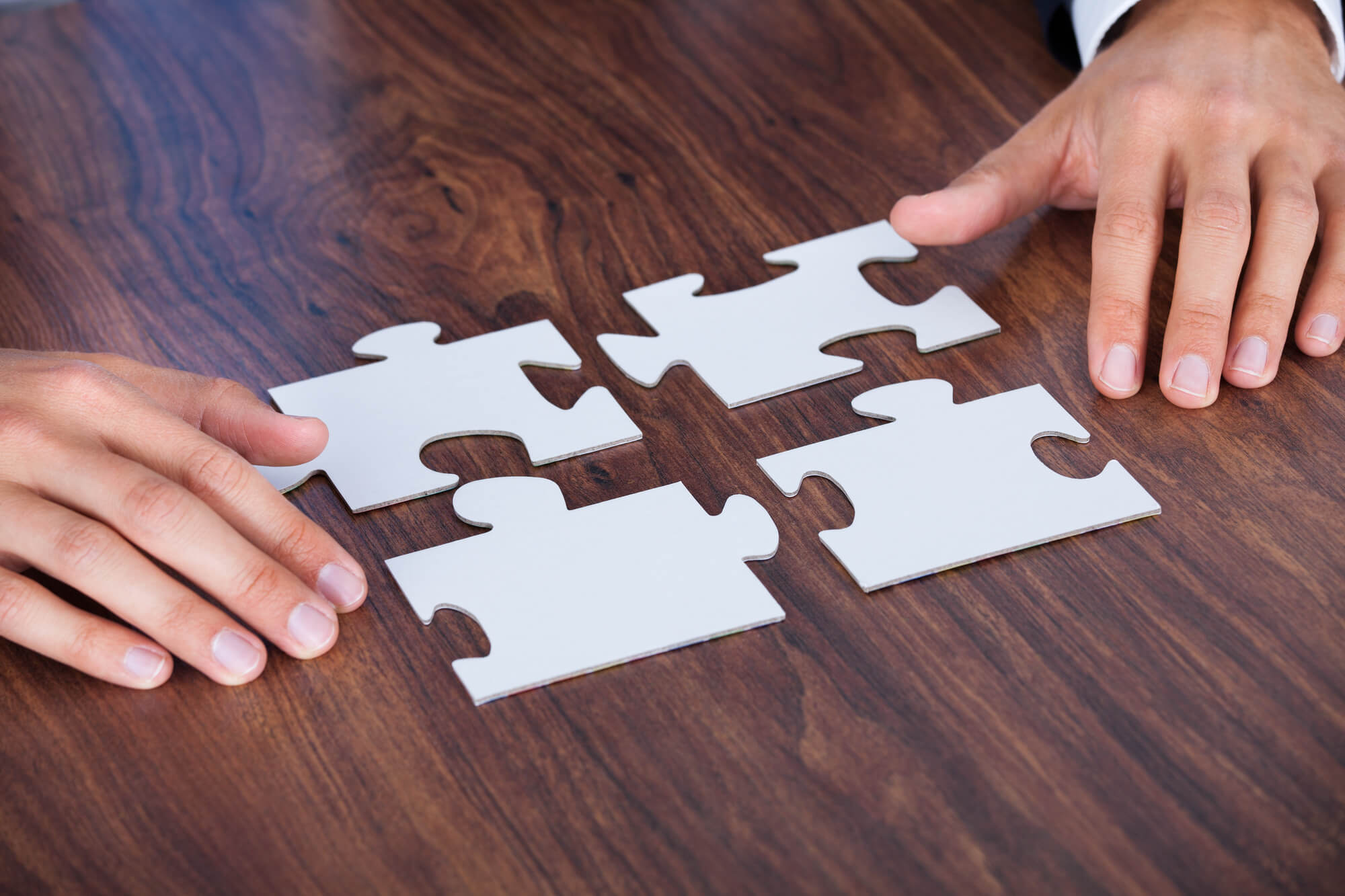 combining puzzle pieces