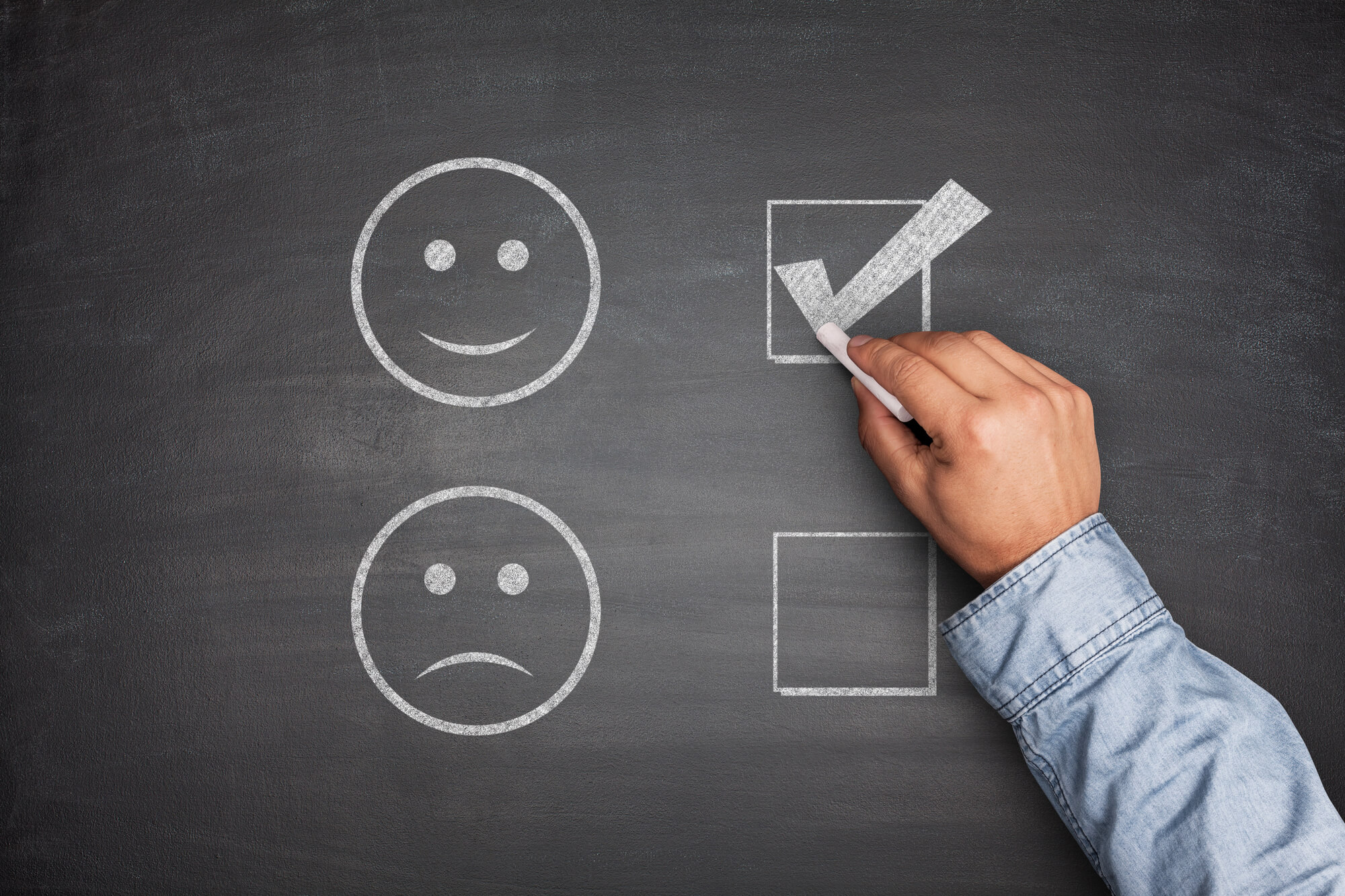 hand checking the positive feedback box on blackboard