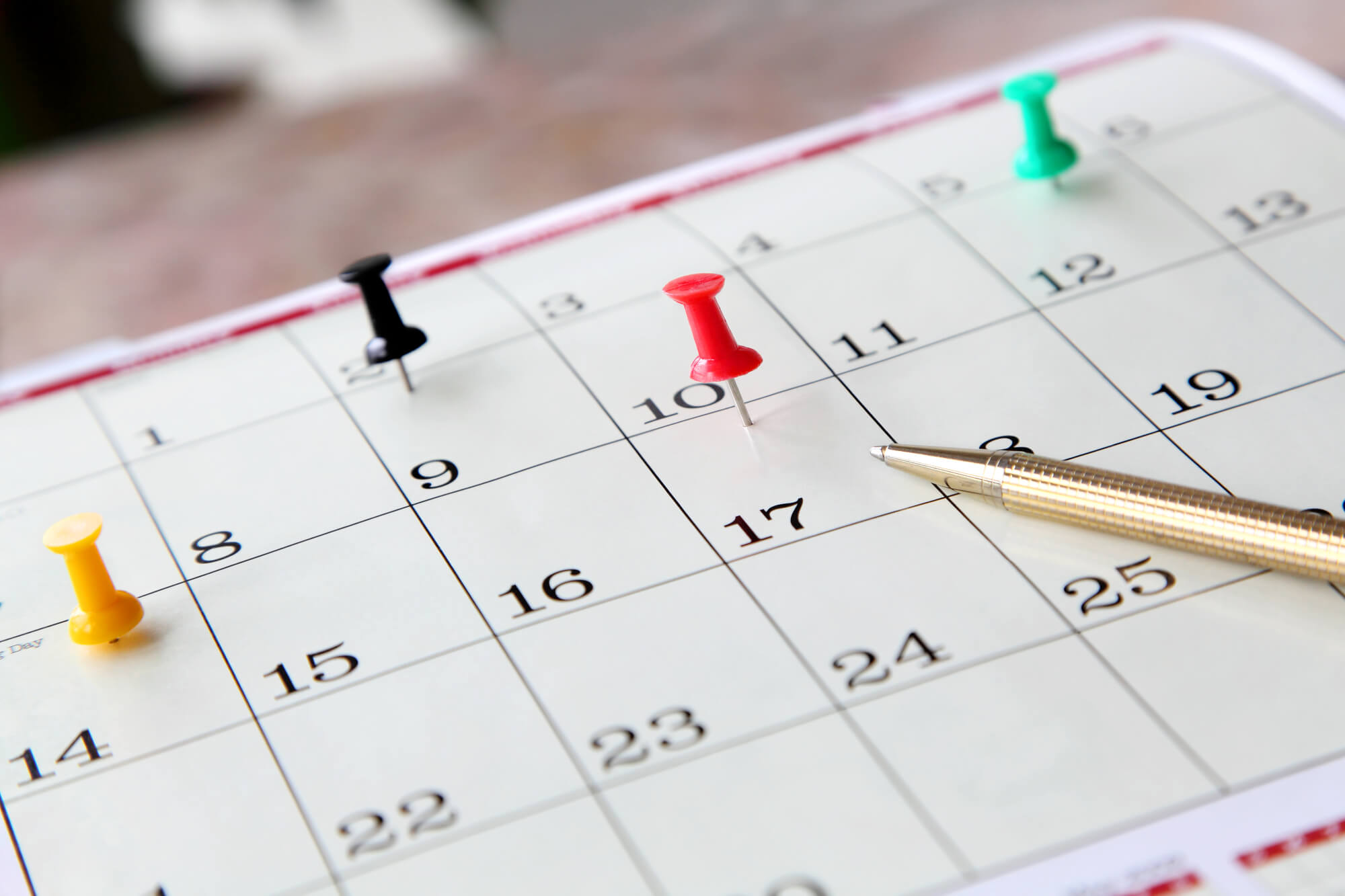 calendar with pins on dates