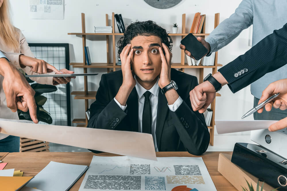 Business man tackles most pressing job first.