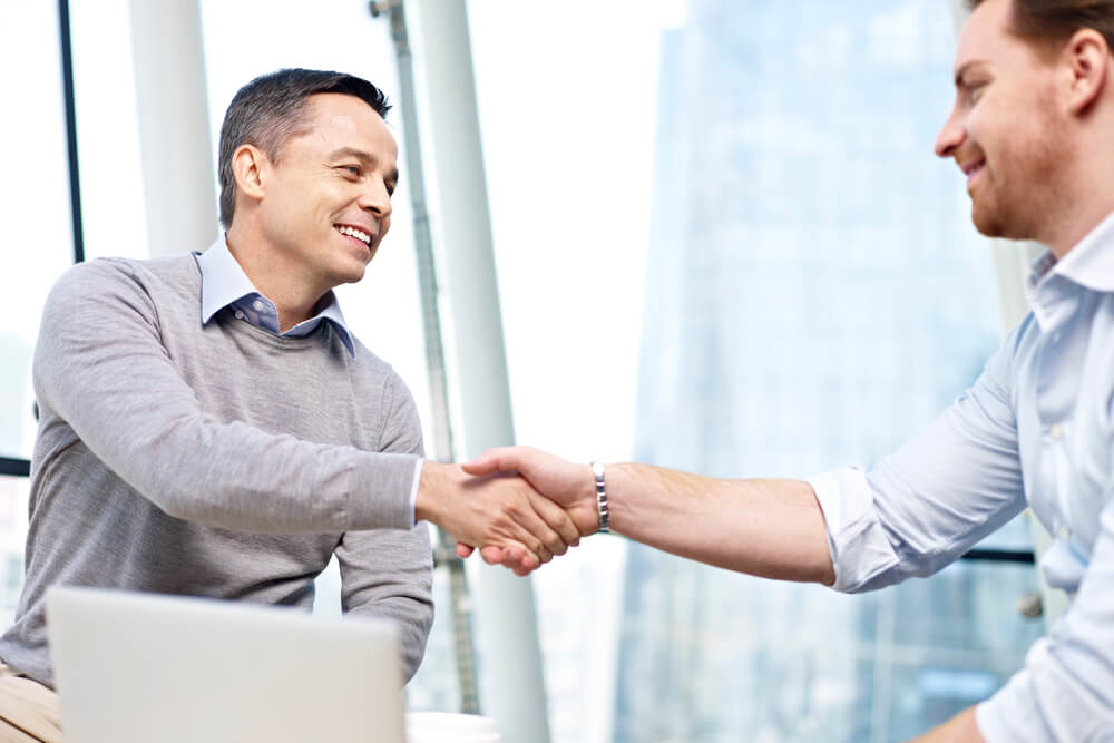 business man and customer shaking hands. 