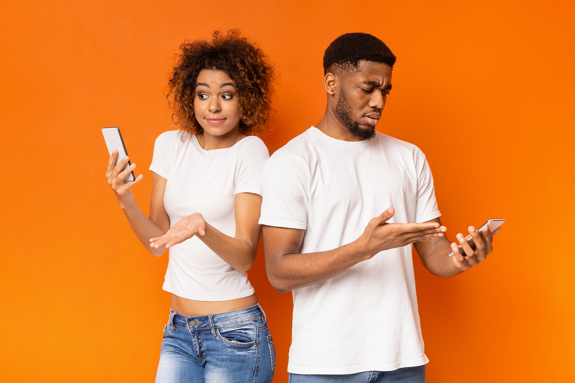 man and woman looking confused