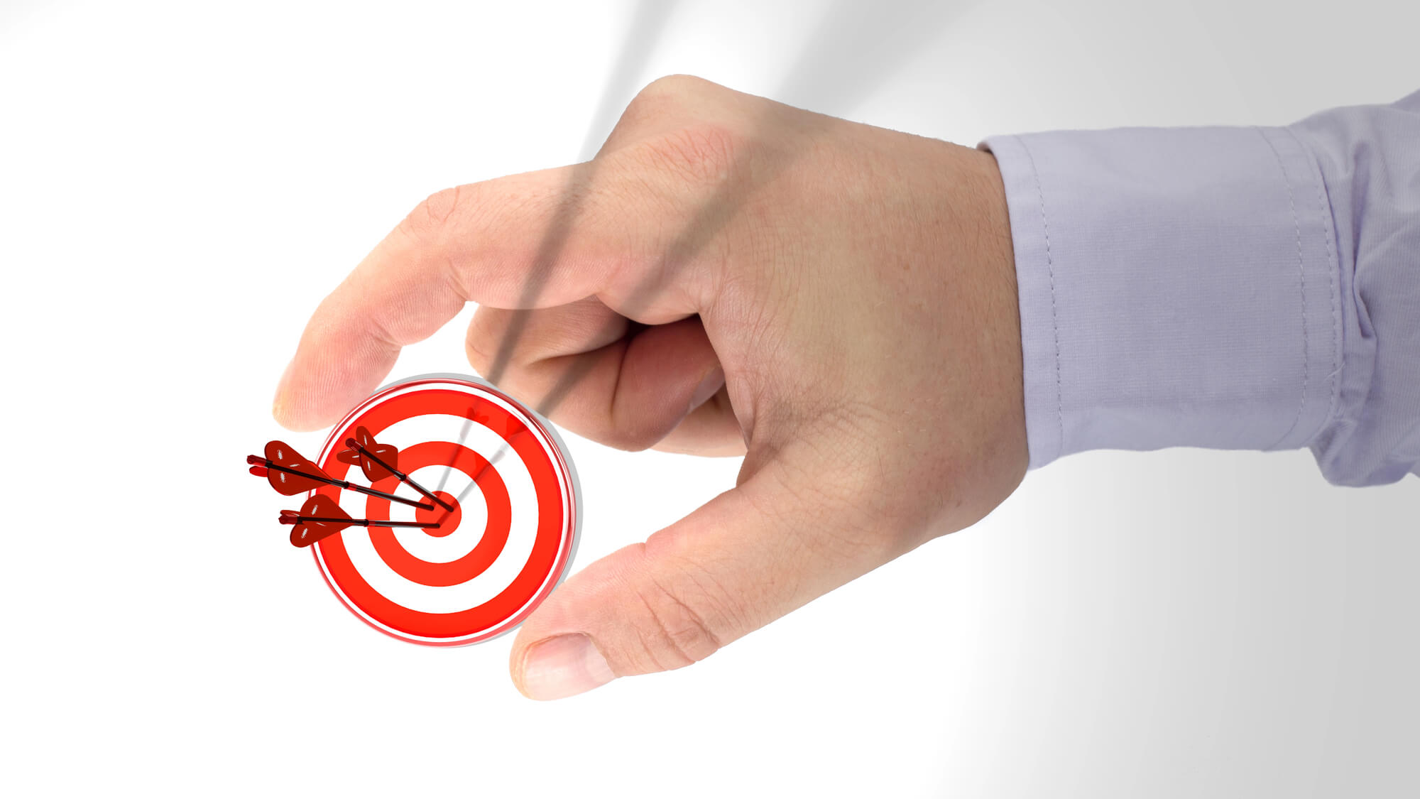businessman holding a target with three arrows at the center 