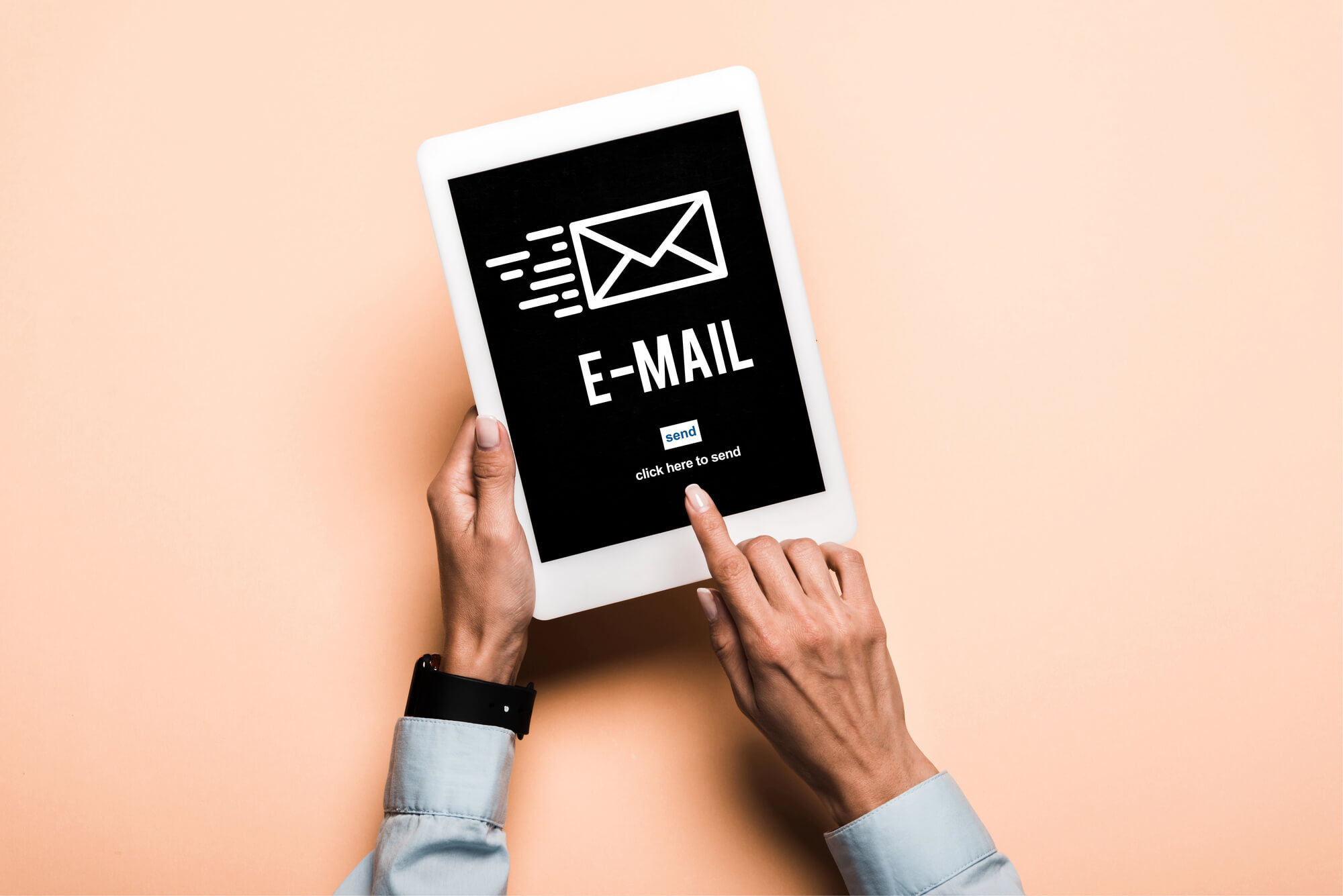 businessman holding tablet with email on screen