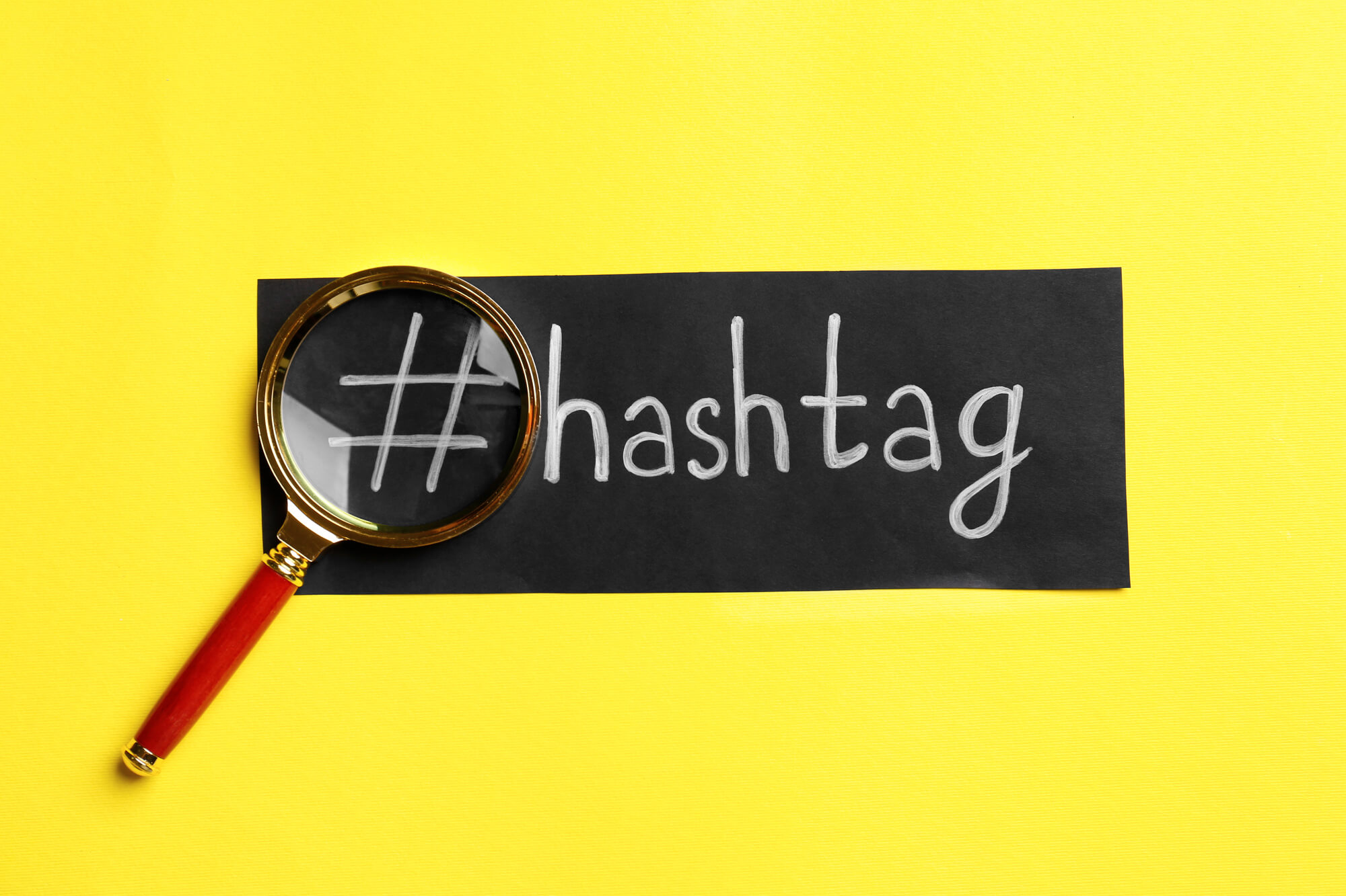 black paper with the  hashtag symbol and word