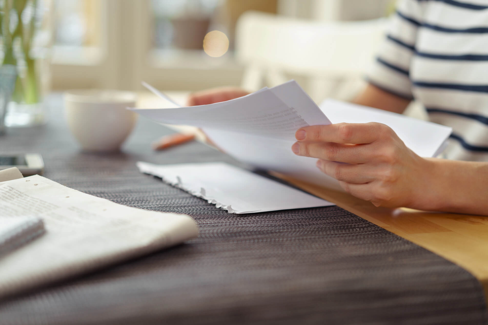 woman reading document