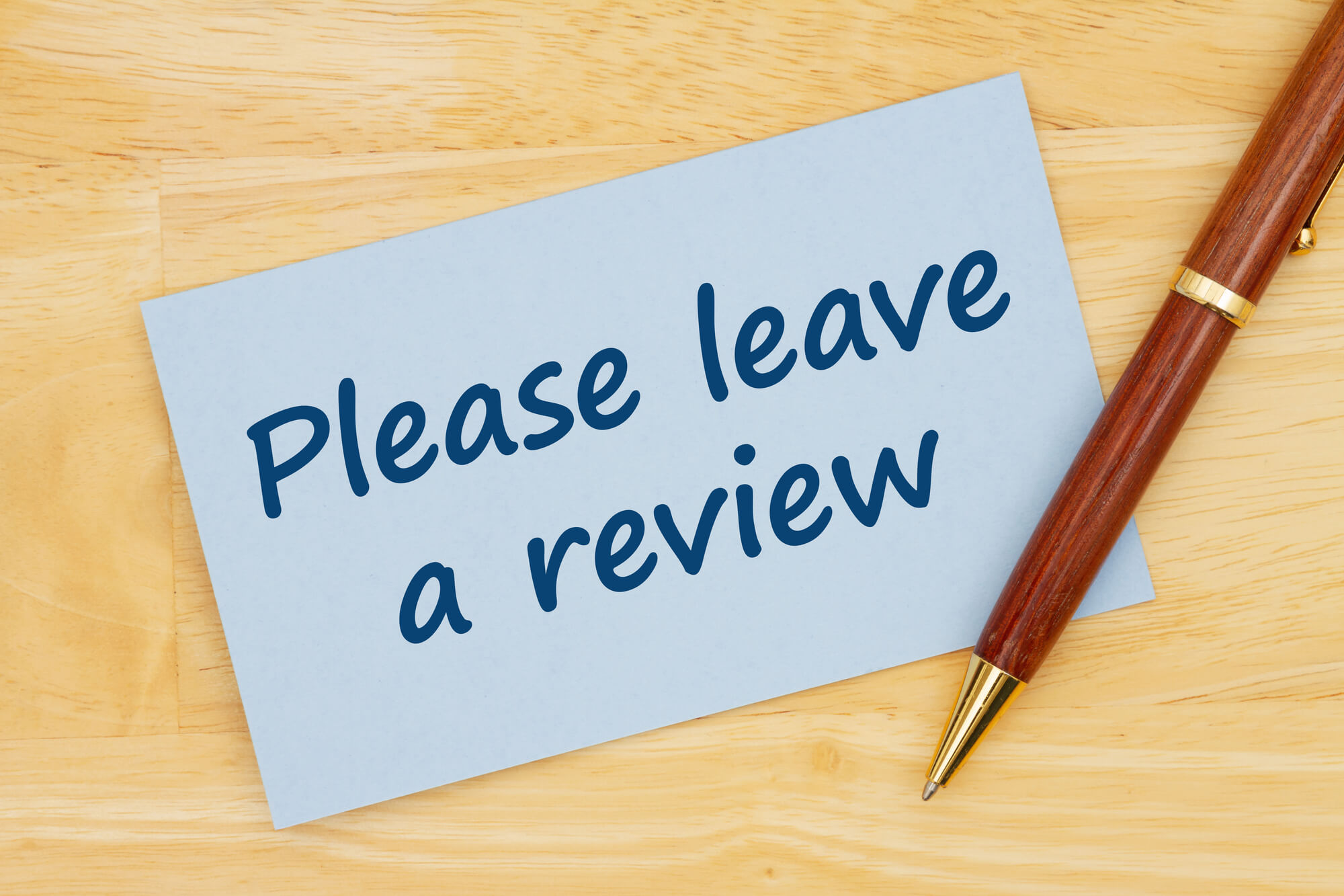 note that says please leave a review