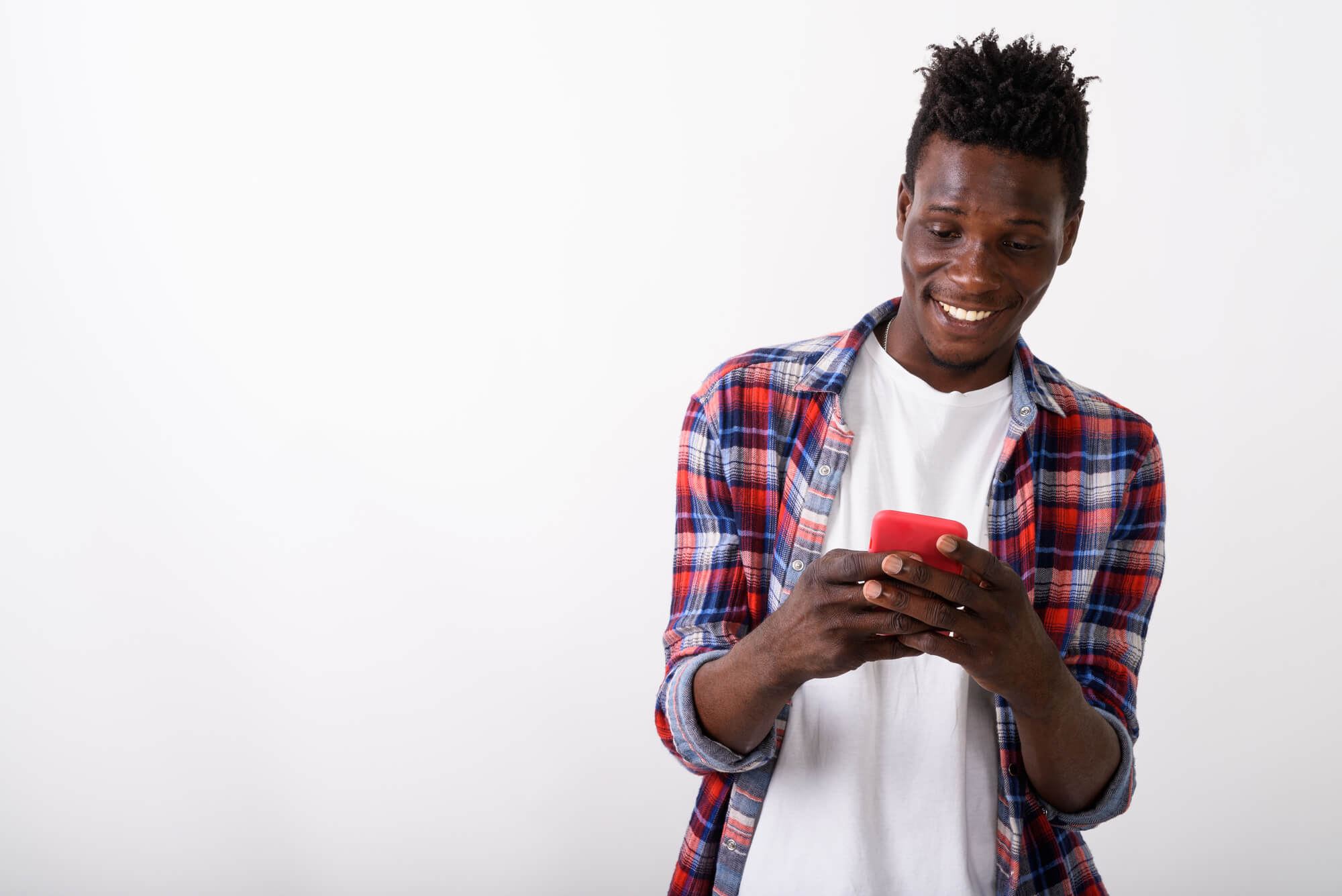 man happily using his phone