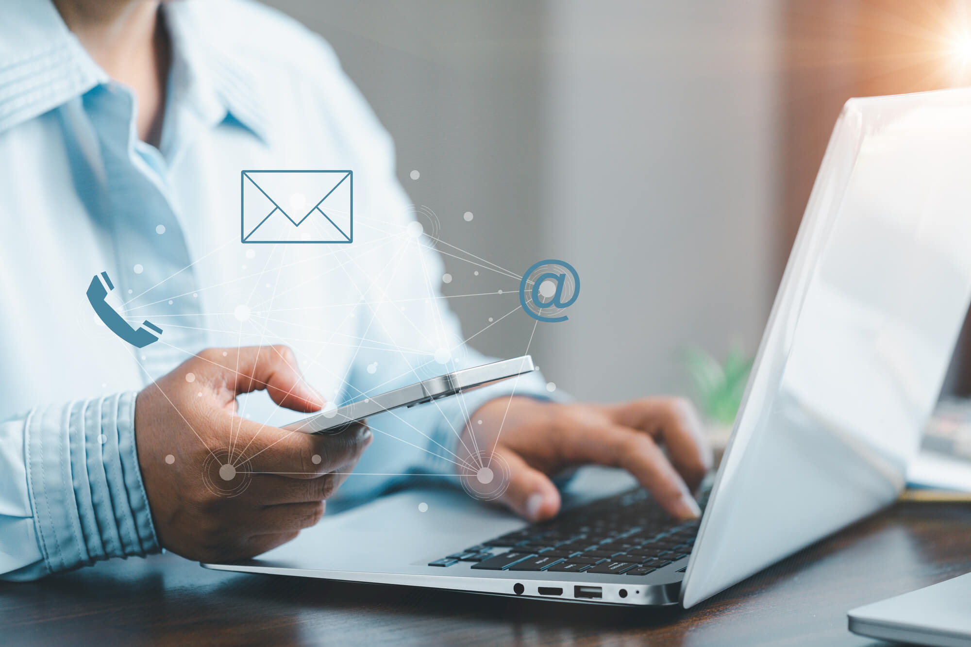 businesswoman using phone and touching on virtual screen contact icons