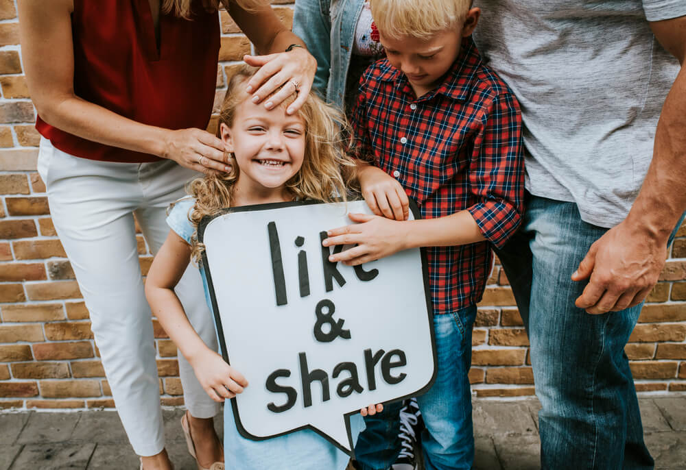 Sharing blog post on social media. 