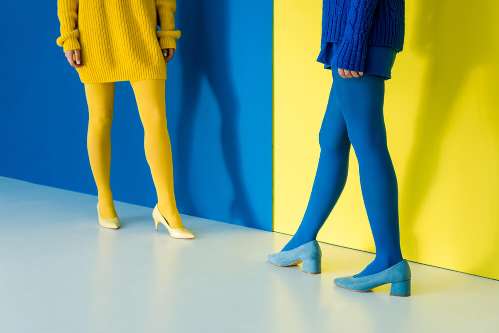 two women wearing contrasting colors web design company