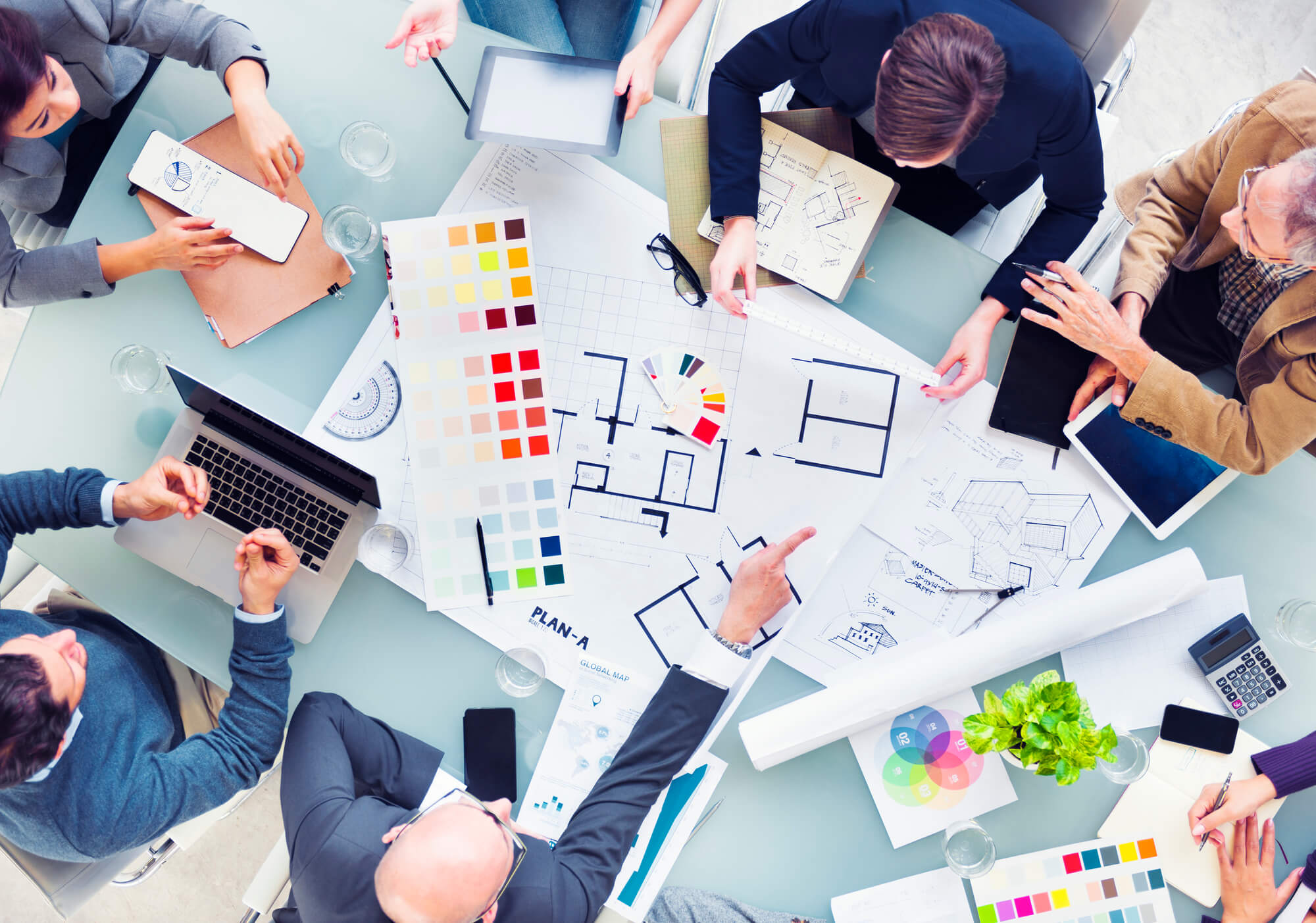 a group of creatives meeting to plan for something