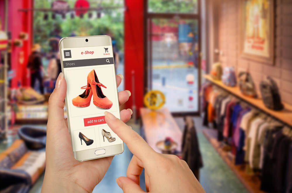 Customer shopping with ease using mobile for holiday gifts.