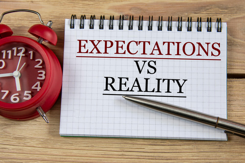 expectations vs. reality written on a pad paper 