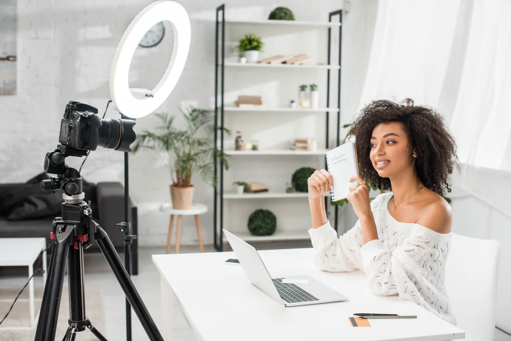 Business owner using good lighting to make high-quality videos.
