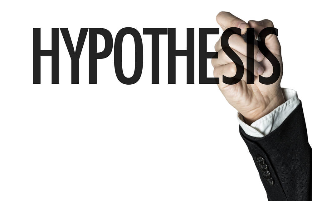 The word "hypothesis" written on a whiteboard. 