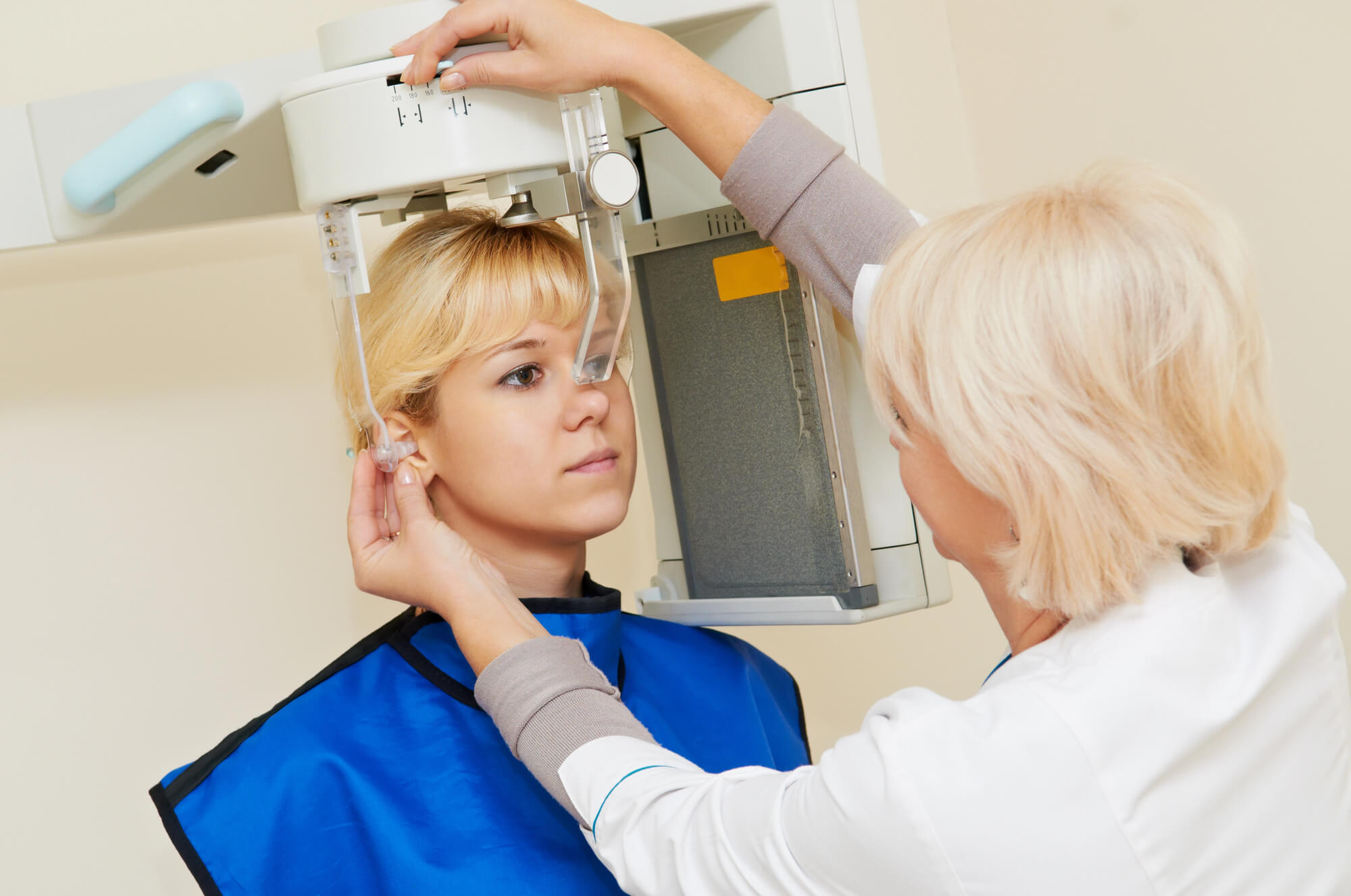 dentist using a digital diagnostic imaging system on a patient