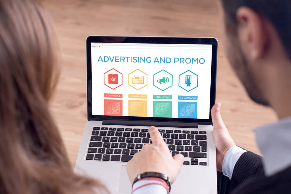 Business owner deciding between social ads and search ads.