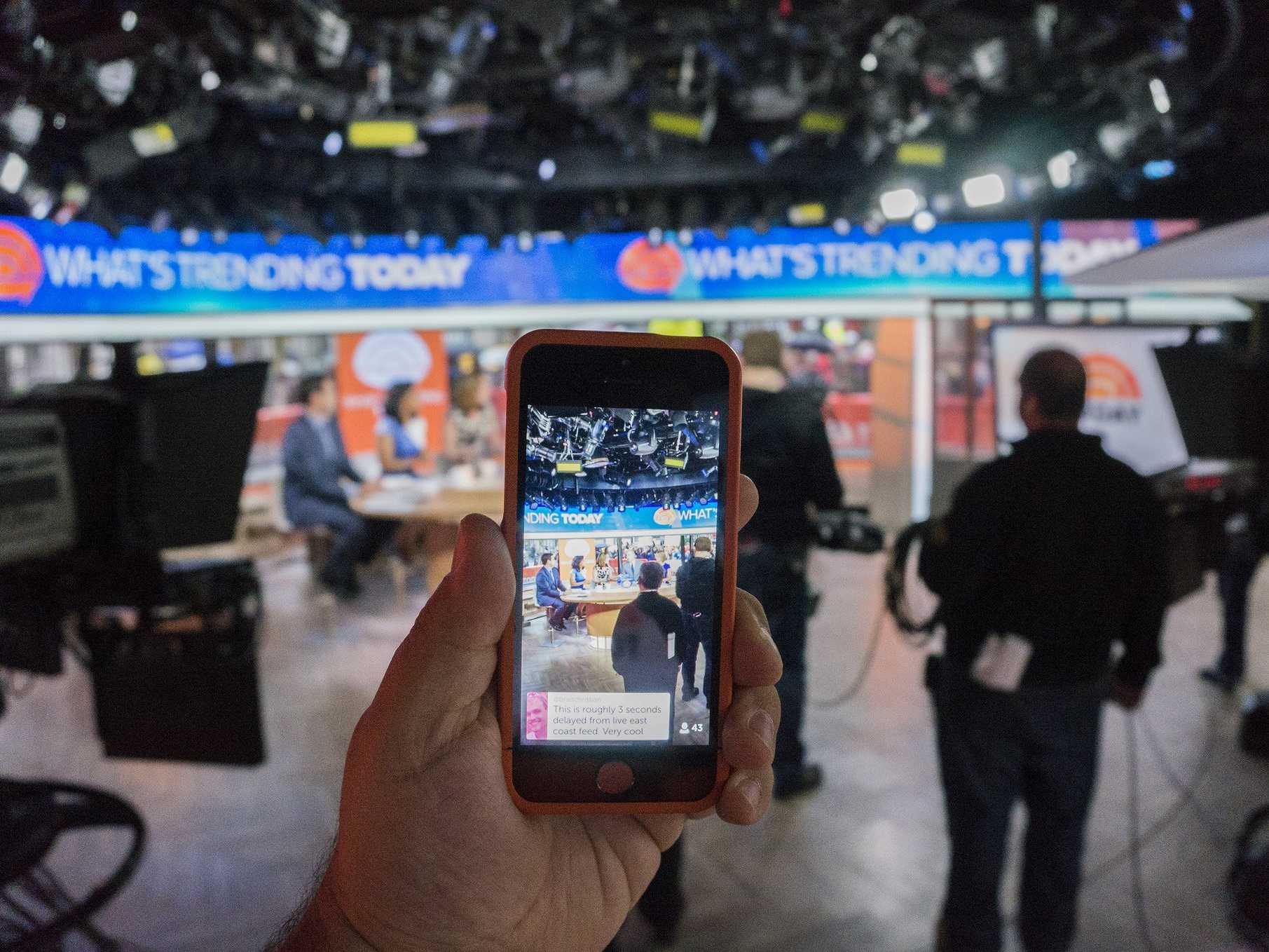 person taking a video of sports news reporters internet marketing