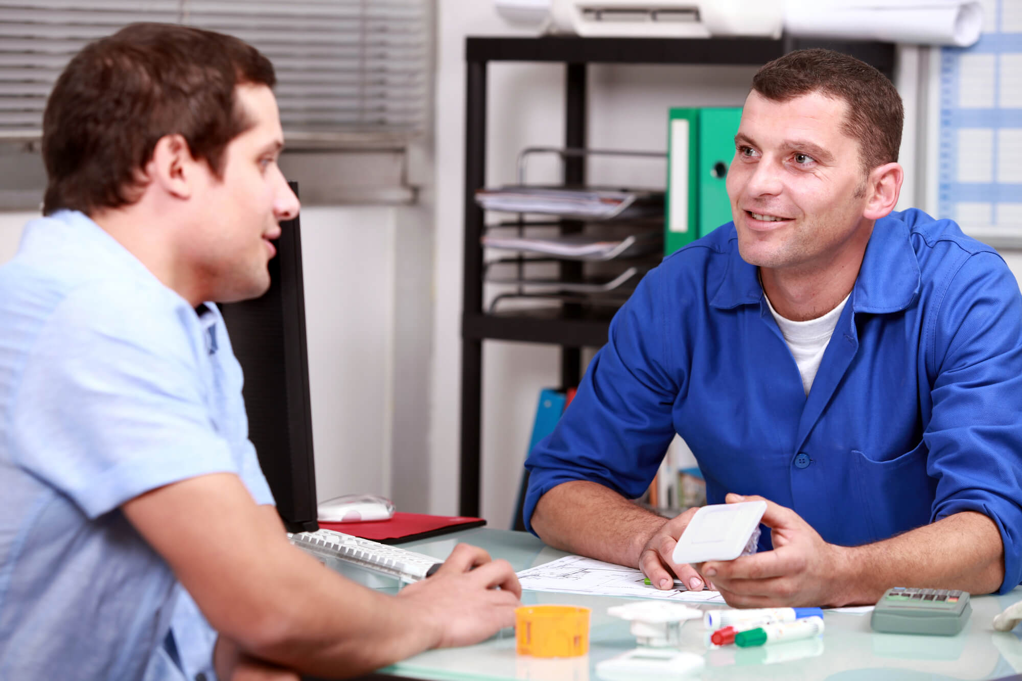 plumber meeting with a customer