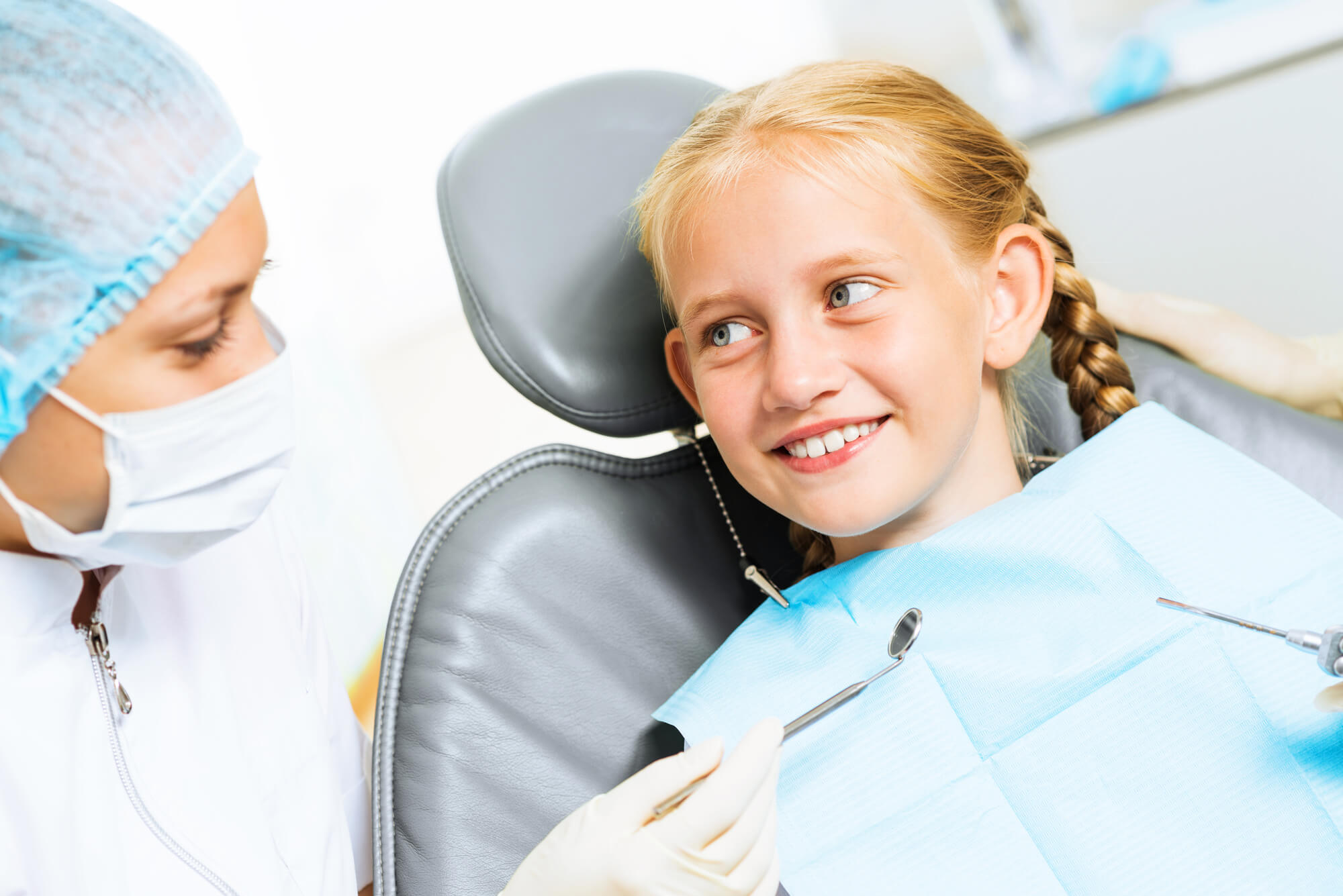 girl smiling after dental work