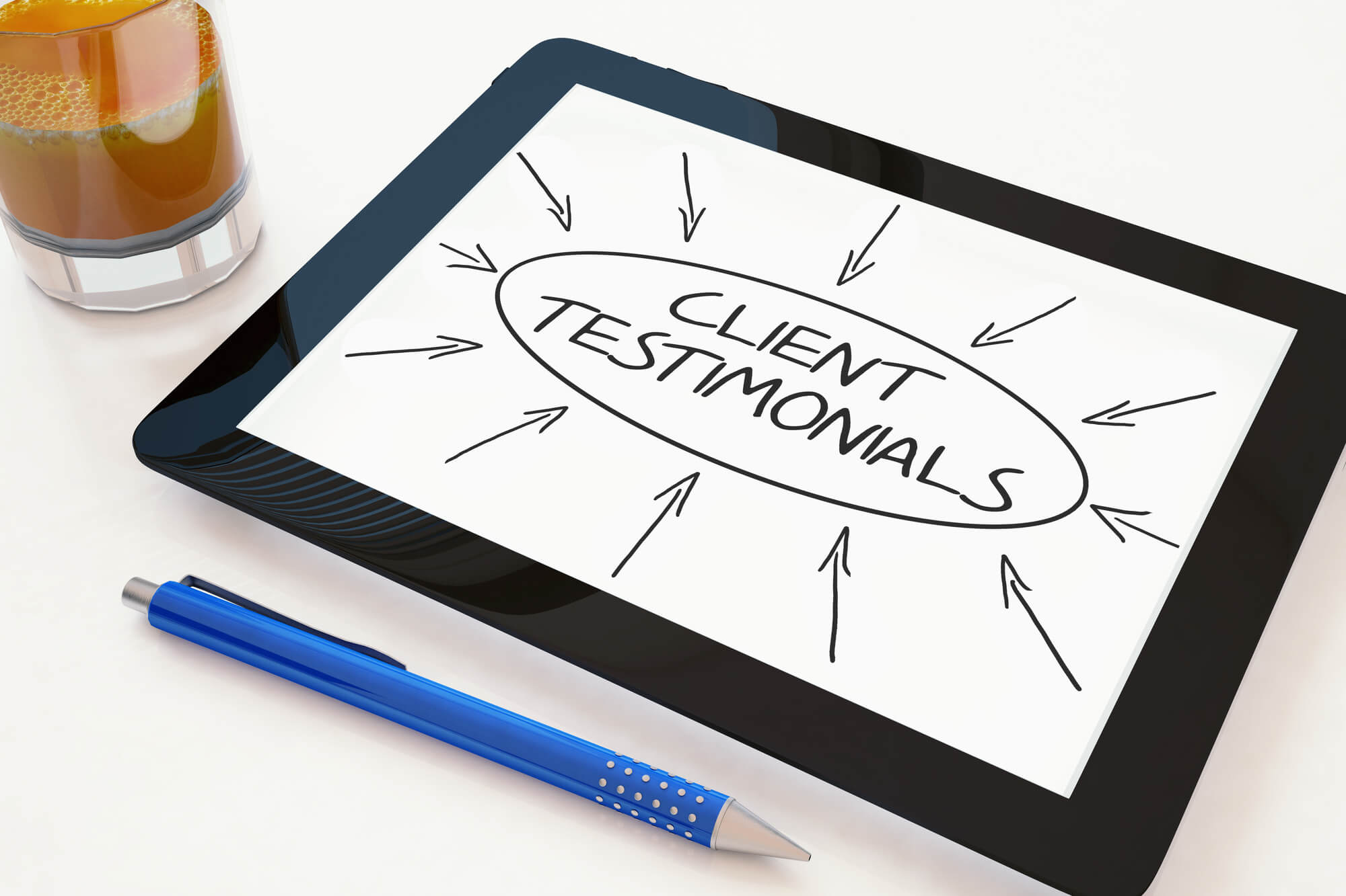 ipad showing client testimonials on screen