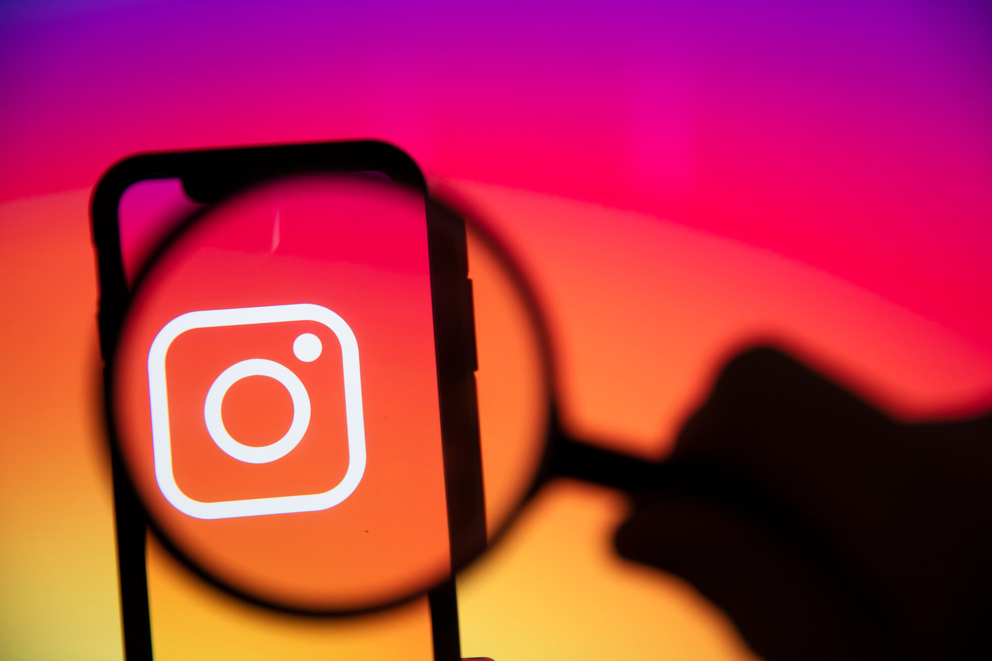 instagram logo under magnifiying glass