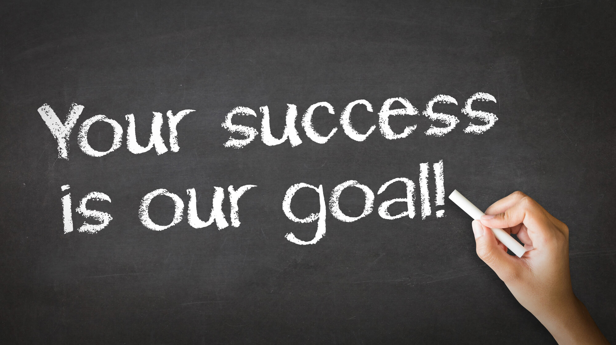 your success is our goal written on blackboard