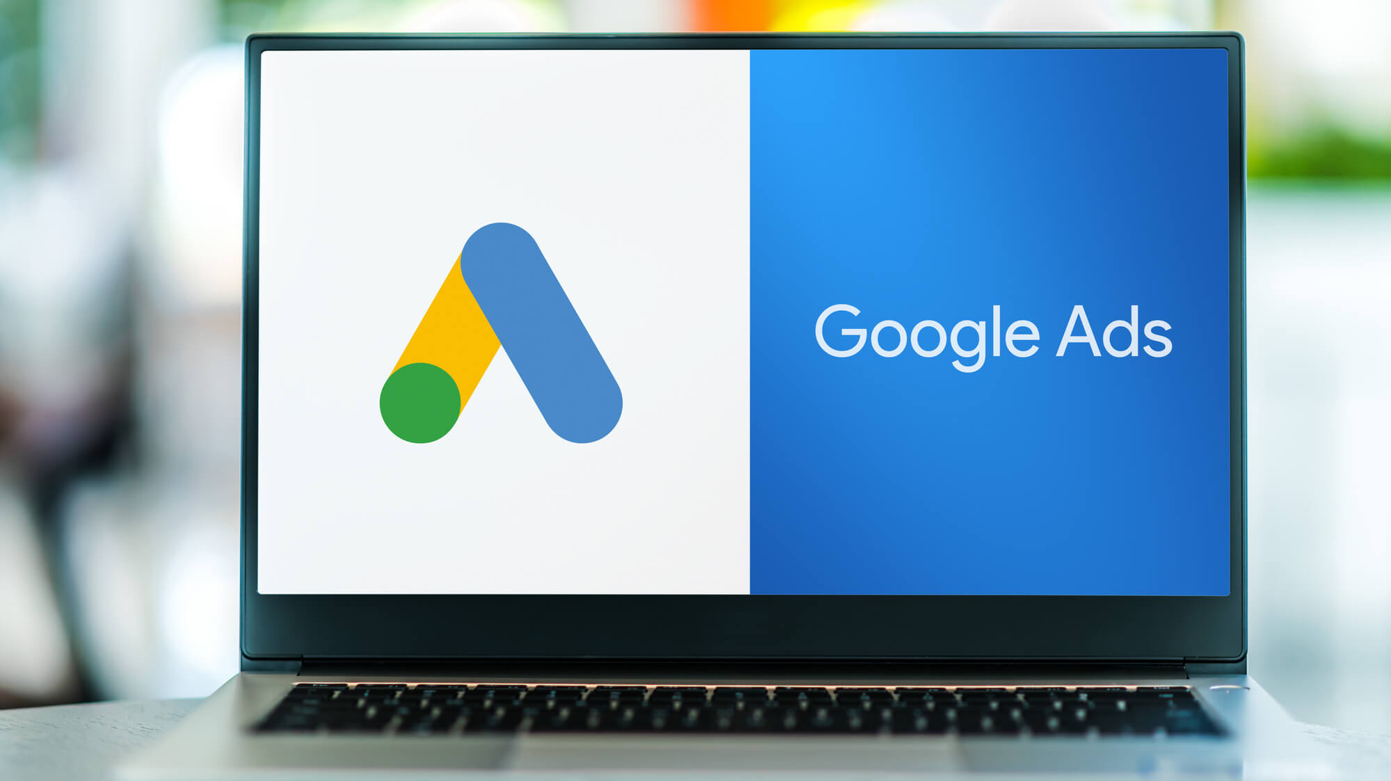 laptop displaying google ads on screen