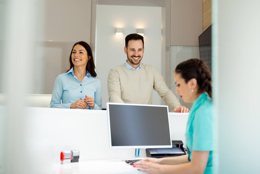 Happy and satisfied patients come back to dental clinic.