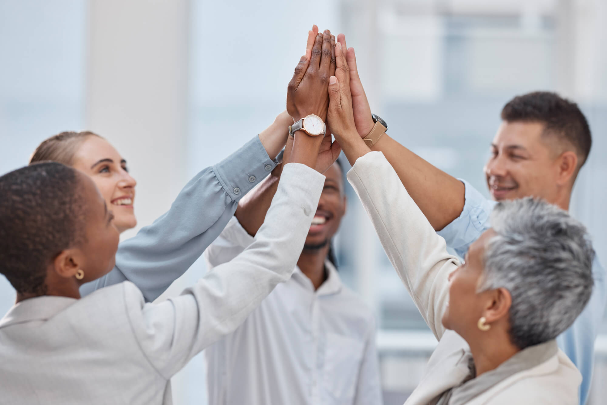 group of business people celebrating collaboration