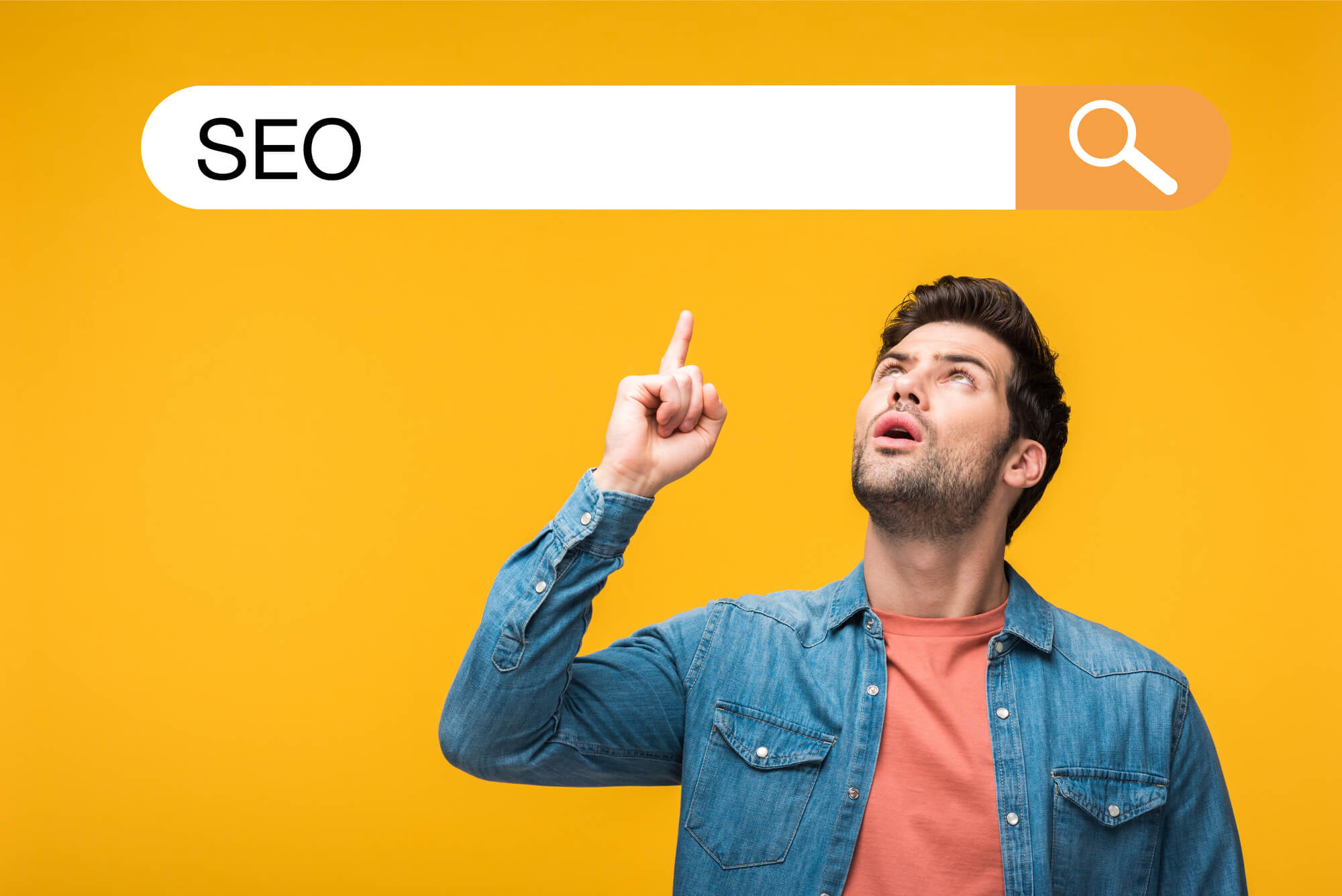 man pointing at SEO keyword in search bar