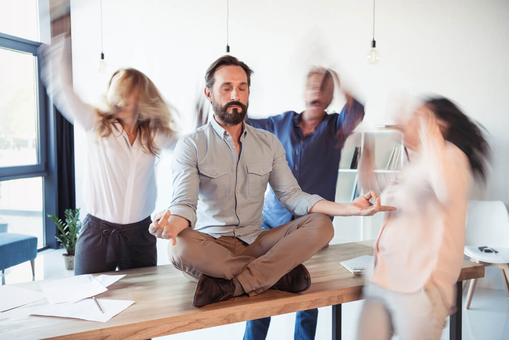 employee meditating inside the Miami SEO company