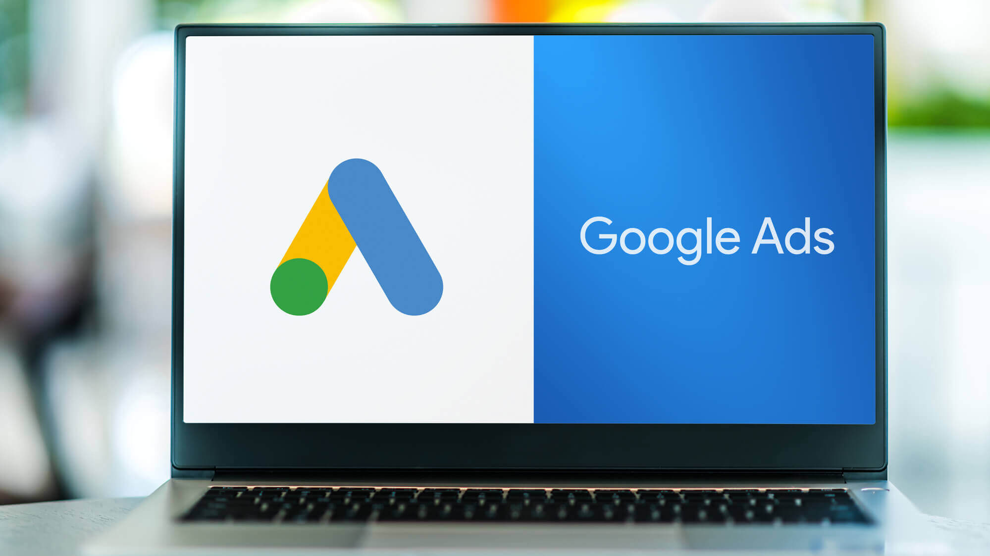 laptop displaying Google Ads on screen
