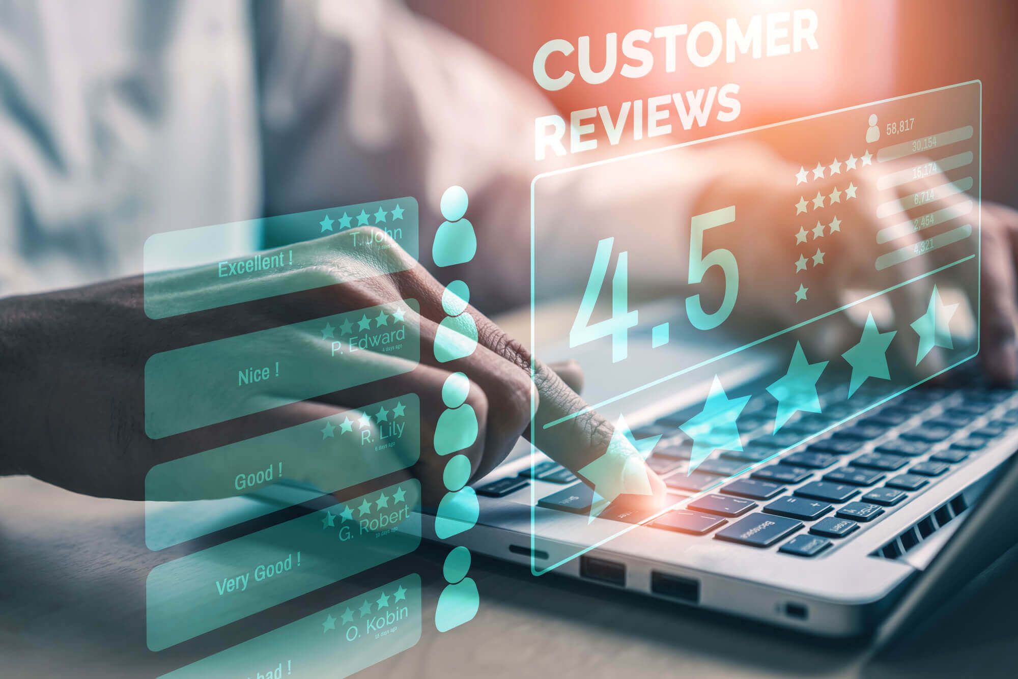 business owner going through customer reviews on laptop
