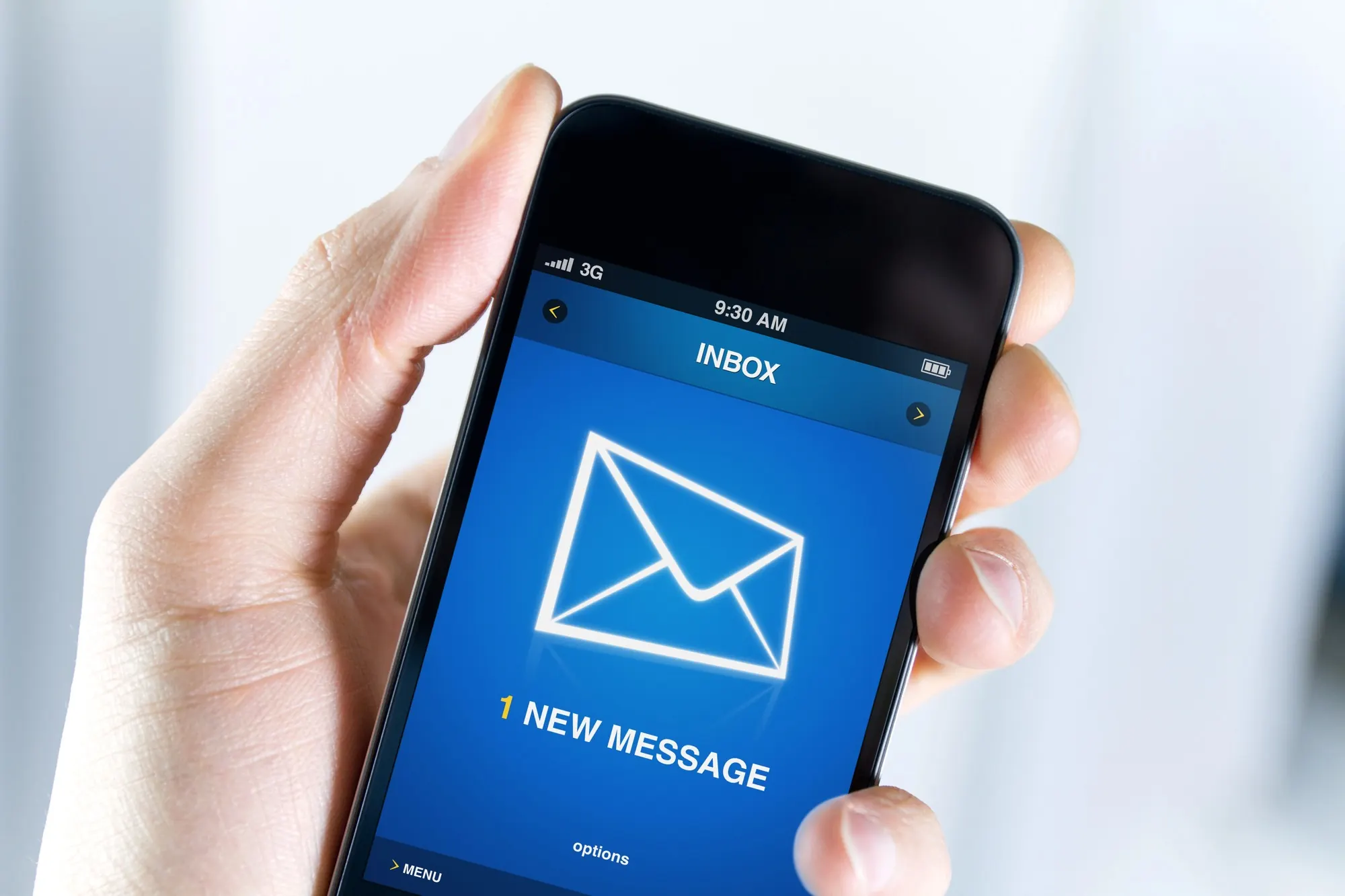 Smartphone displaying a new email notification, representing dental marketing email campaign engagement and patient communication