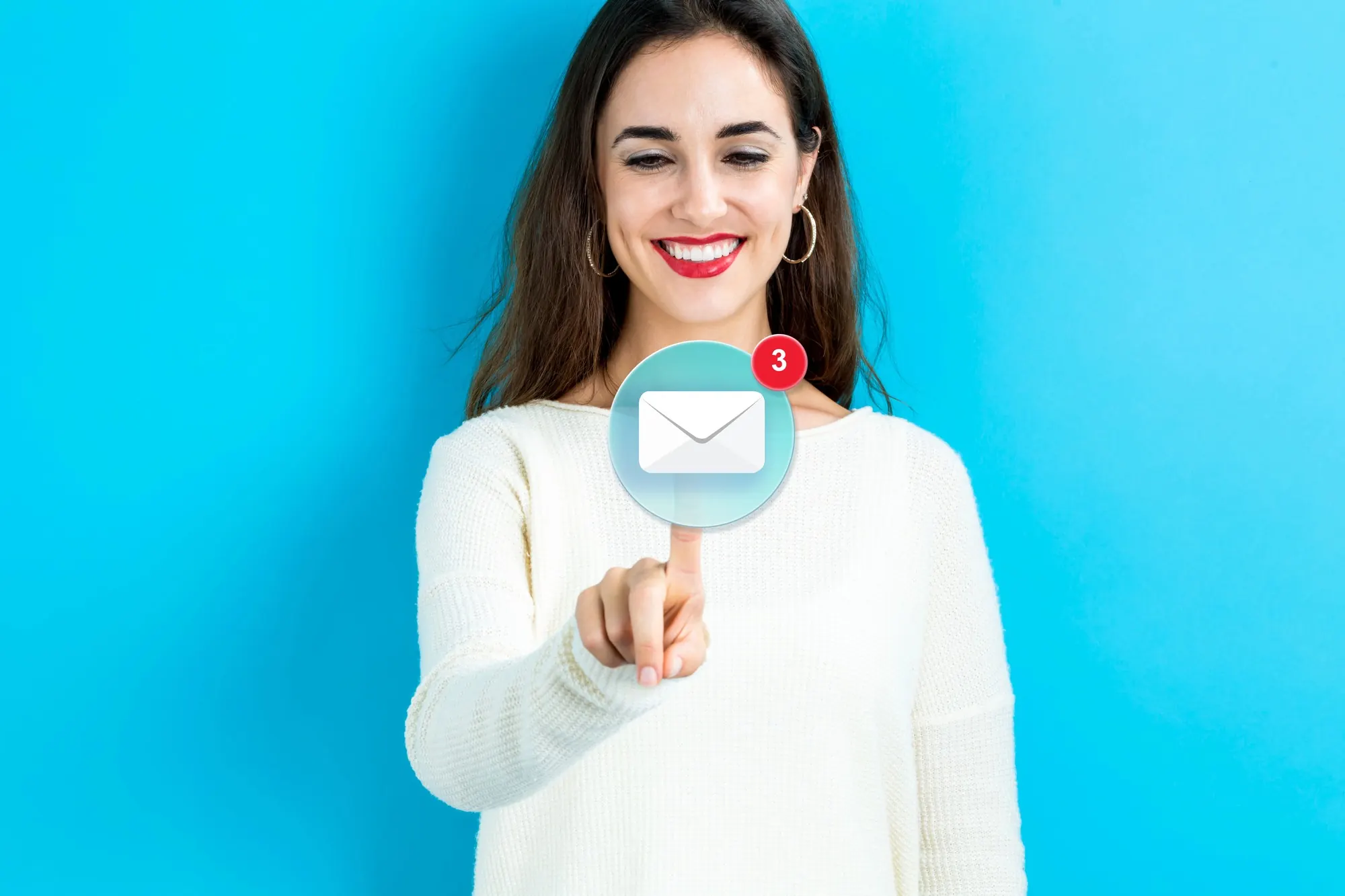 Woman interacting with an email notification icon, representing dental marketing email outreach and patient engagement campaigns