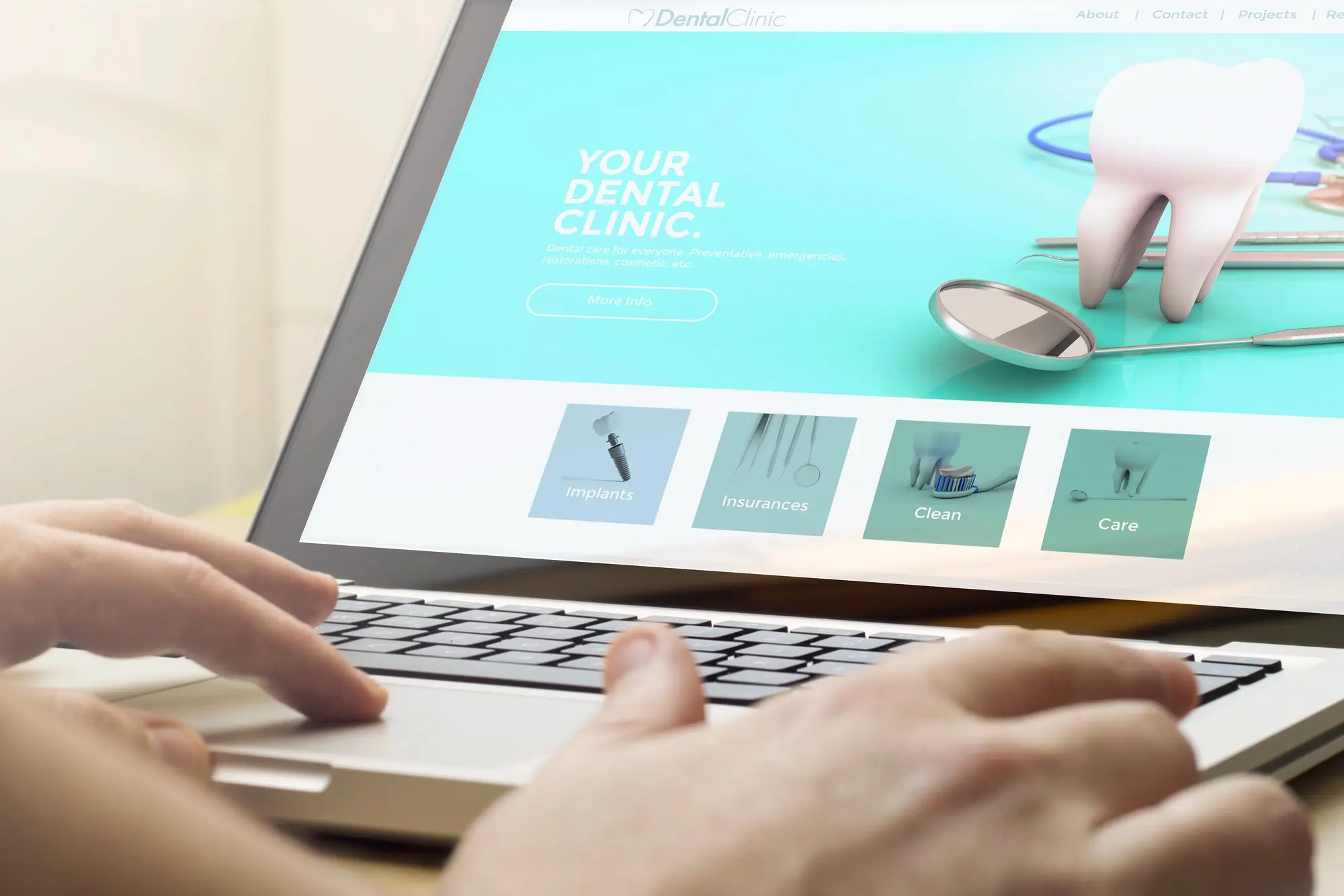 Person browsing a modern dental practice website on a laptop, illustrating digital marketing and getting your practice into AI search results