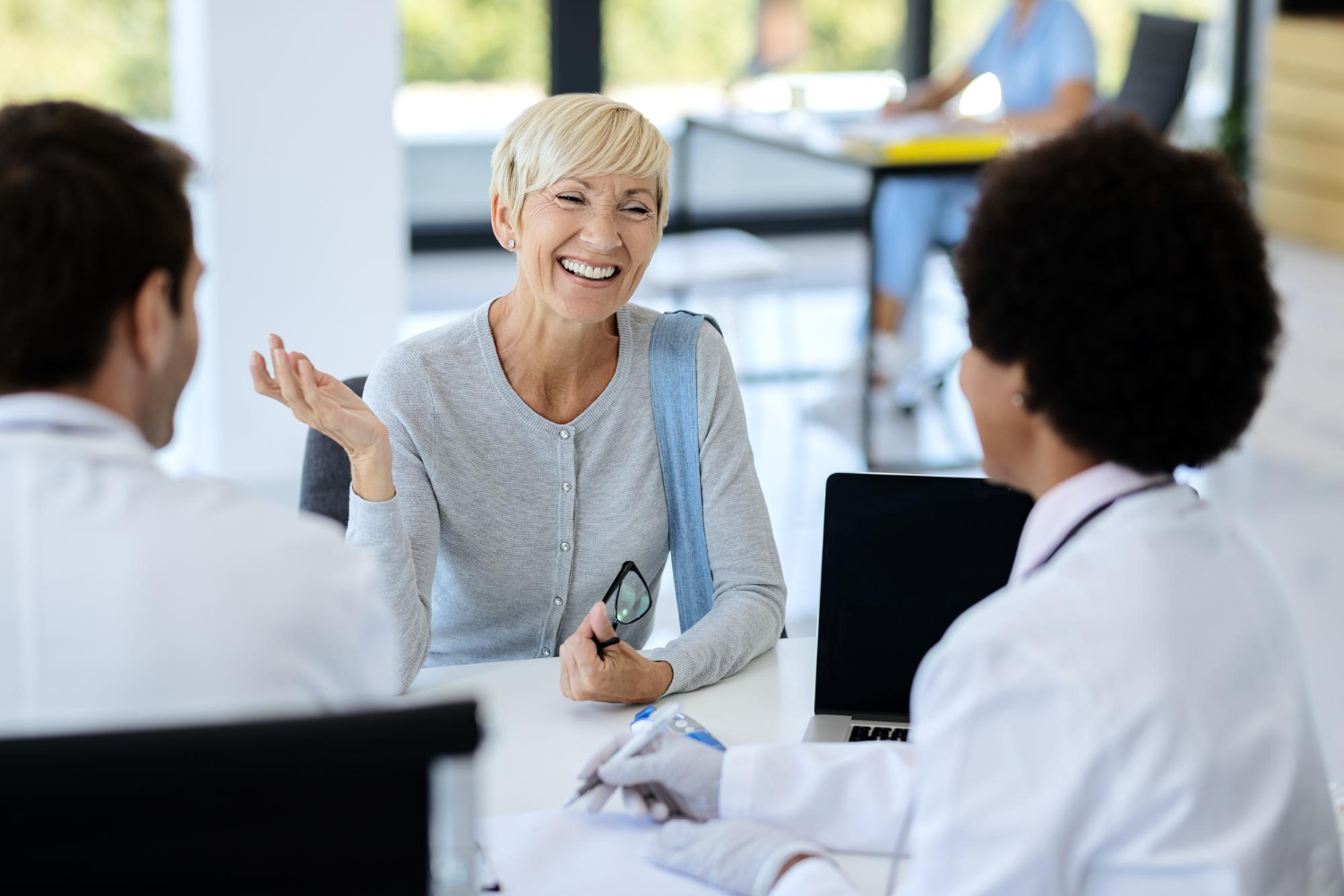 Aevum clinician talking with a patient during a consultation in Houston