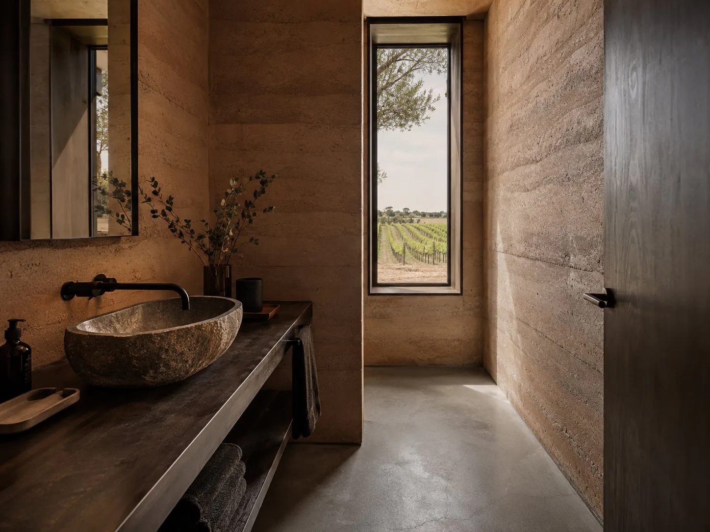 Commercial bathroom with views of vineyard