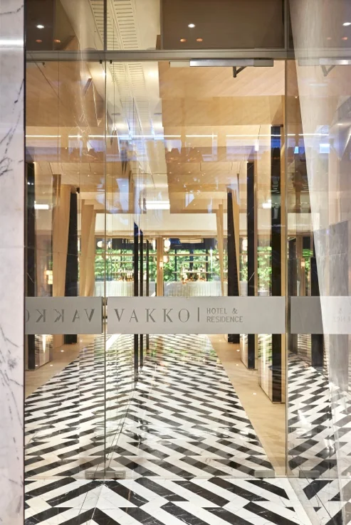 Entrance of Vakko Hotel & Residence Nişantaşı with patterned marble floor