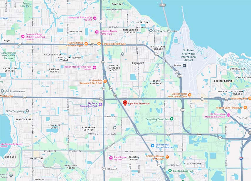 Map showing part of Clearwater, Florida, including neighborhoods like Highpoint, Shady Lane Village, and Overlook, major roads such as US-19 and 66th Street, points of interest including St. Pete-Clearwater International Airport, Tampa Bay Grand Prix, and various parks and restaurants like Raising Cane's Chicken Fingers and Long Horn Steakhouse.